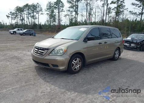 2010 Honda Odyssey Lx z USA, uszkodzony, nr VIN 5FNRL3H26AB097777
